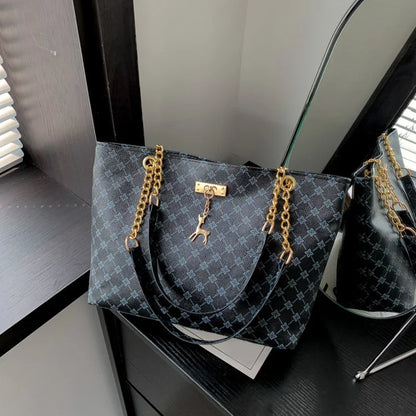 Black leather tote bag for women with structured silhouette and everyday carry design