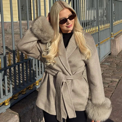 The Refined Wrap Coat in beige with faux fur trim
