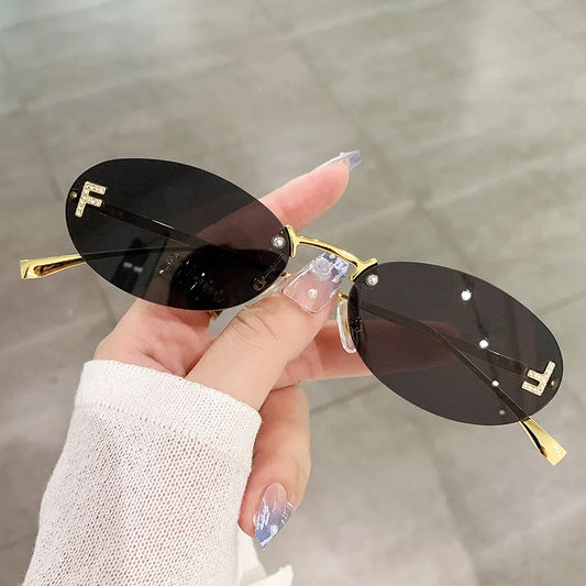 The Slim Oval Rimless Sunglasses in black